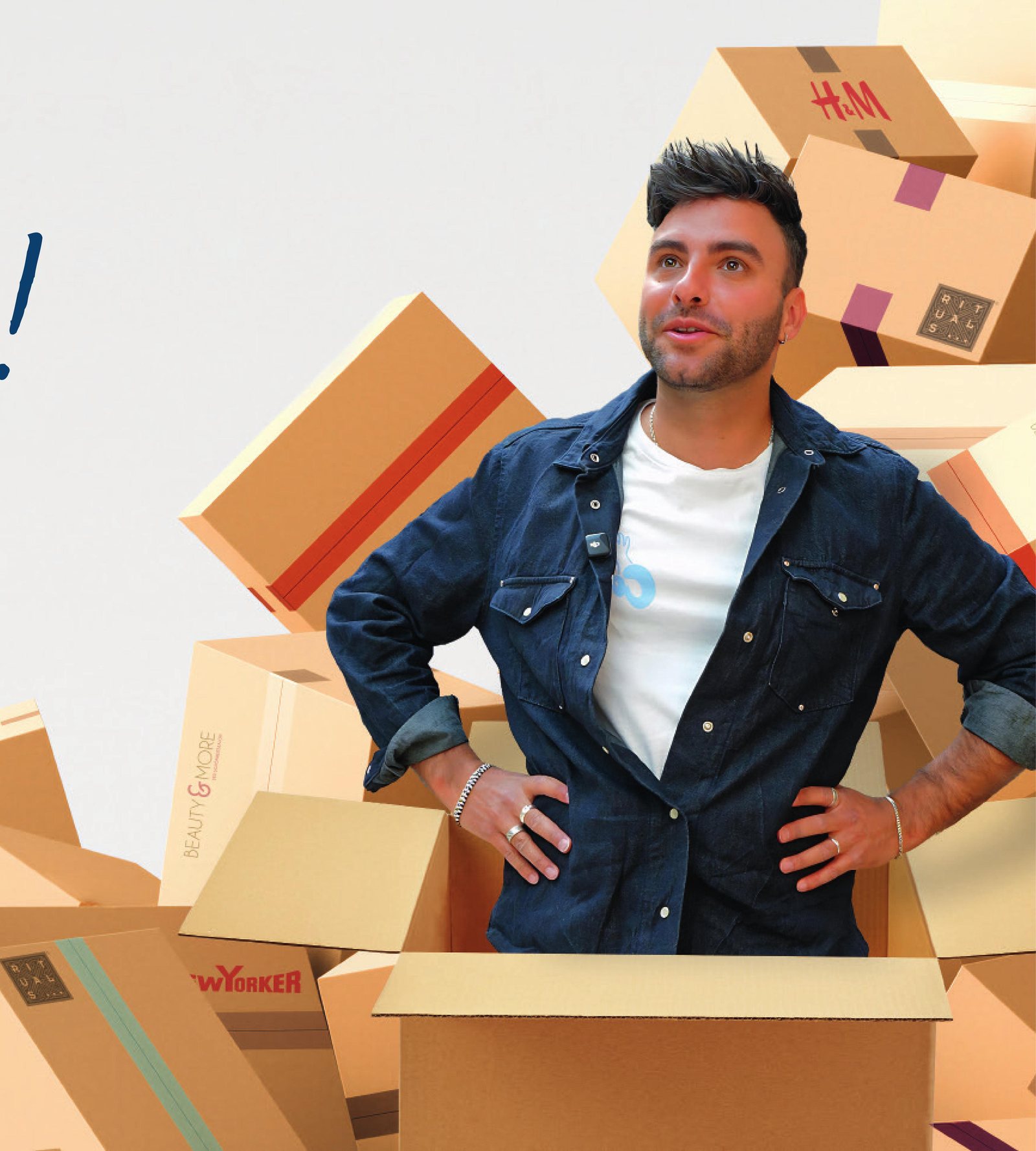 Sandro steht in einem Karton zwischen Boxen mit den Logos der neuen OEZ-Stores
